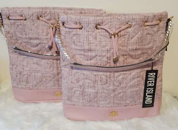 Pink quilted drawstring bag